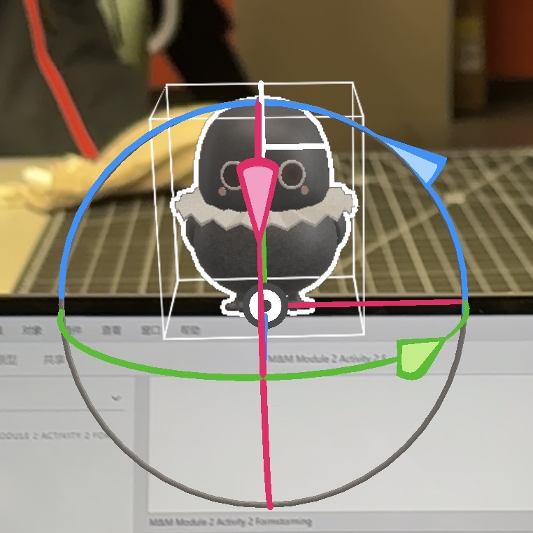 Adjusting the angle and size of the AR object to make it looks like standing on my computer
