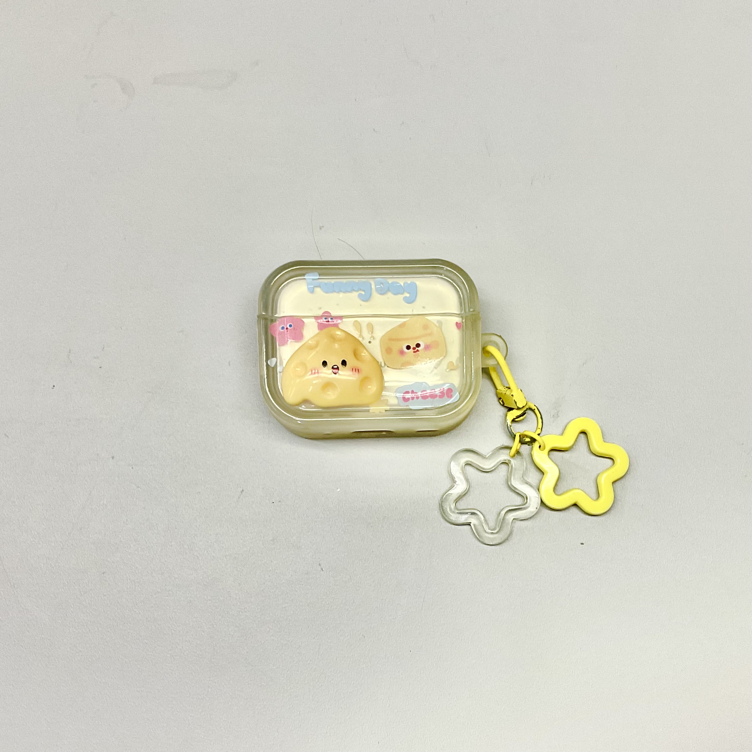 front view of a yellow earbuds case